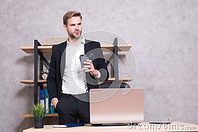 Little break for relax. Businessman drinking coffee. Confident man drinking coffee. Boss workplace. Handsome man in Stock Photo