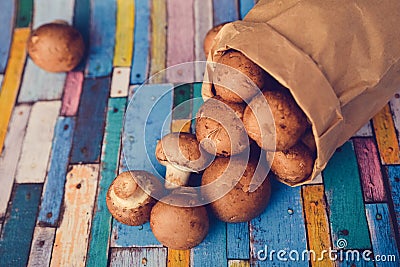 Little brwon mushrooms in a paper bag Stock Photo