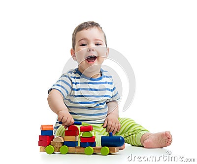 Little cheerful baby with block toys Stock Photo