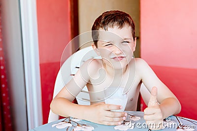 Little child boy drinking cold milk Stock Photo