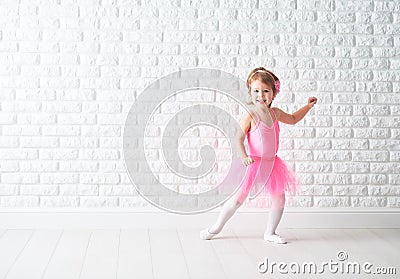 Little child girl dreams of becoming ballerina Stock Photo
