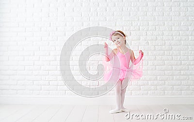 Little child girl dreams of becoming ballerina Stock Photo