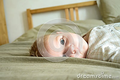 Little child with intent look Stock Photo