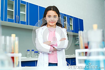 Little child with learning class in school laboratory serious Stock Photo