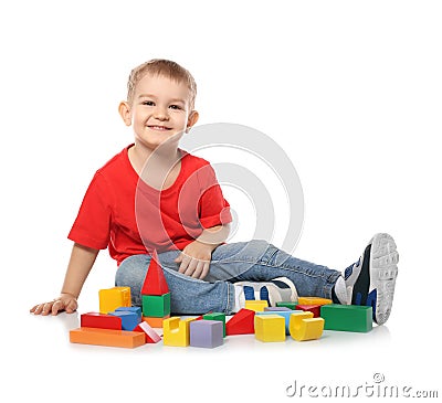 Little child playing with colorful building blocks on white Stock Photo