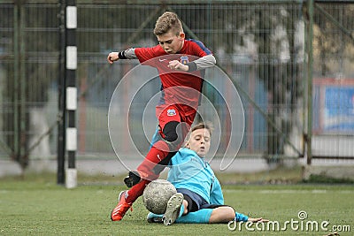 Little children playing football or soccer Editorial Stock Photo