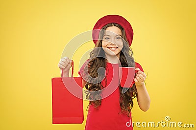 Little coffee break and keep buying. Shopping and purchase. Black friday. Shopping day. Child hold package. Girl with Stock Photo