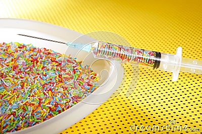 Little colorful candy syringe Stock Photo