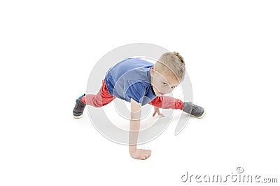 Little cool hip-hop boy in dance. Studio shot. Stock Photo