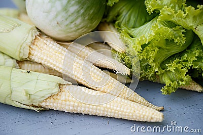 Little corn, green salad and eggplant Stock Photo