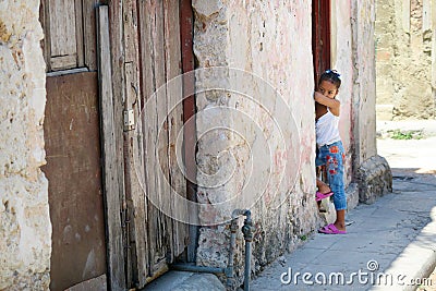A little cuban girl is waiting for her mommy Editorial Stock Photo