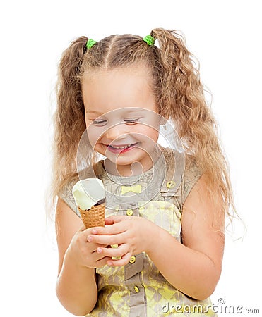 Little curly girl eating ice cream in studio Stock Photo