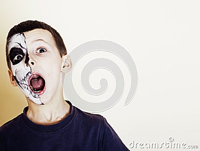 Little cute boy with facepaint like skeleton to celebrate hallow Stock Photo