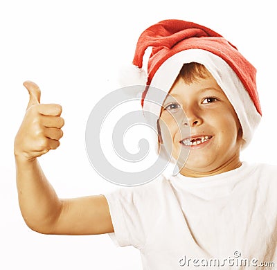 Little cute boy in santas red hat isolated thumbs Stock Photo