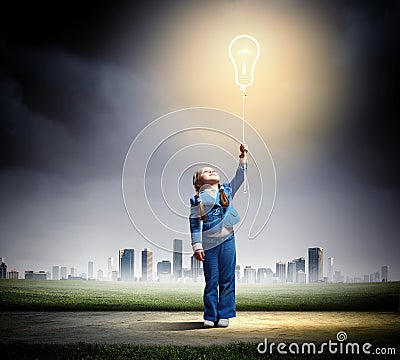 Little cute girl with bulb balloon Stock Photo