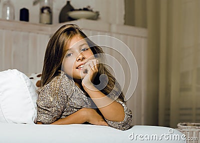 Little cute girl at home smiling Stock Photo