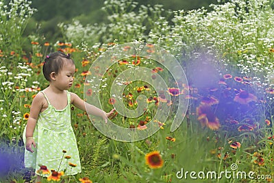 Little daughter touching nature Stock Photo