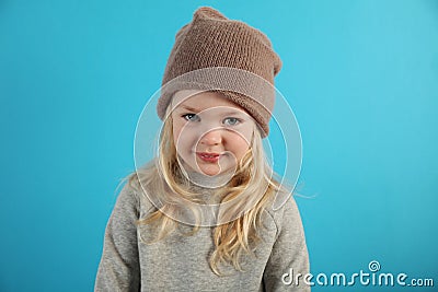 Little fashionable girl in a hat Stock Photo