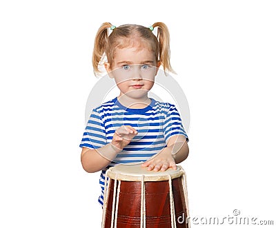 Little Funny girl play drum. Stock Photo