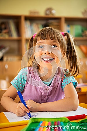 Little funny schoolgirl Stock Photo