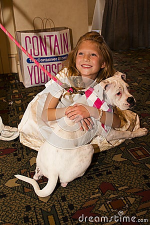 Little Girl Adopts Rescued Humane Society Pet Dog Editorial Stock Photo