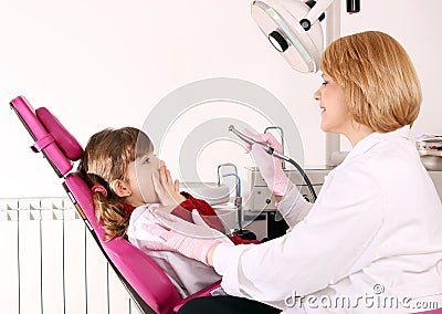 Little girl is afraid of the dentist Stock Photo