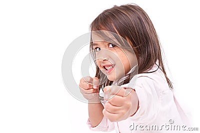 Little girl assuming stance, practicing martial arts Stock Photo