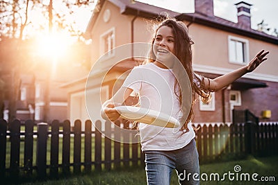 Little girl on backyard Stock Photo