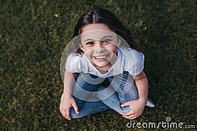 Little girl on backyard Stock Photo