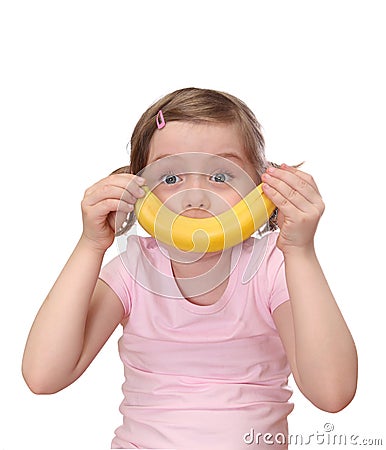 Little girl with banana Stock Photo