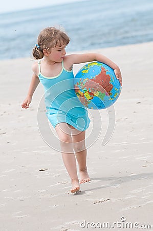 Little girl at the beach Stock Photo