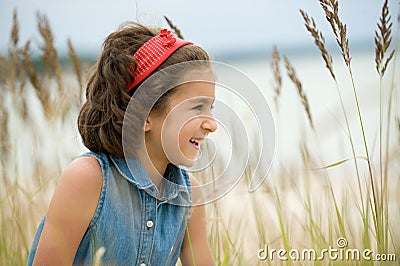 Little girl on the beach Stock Photo