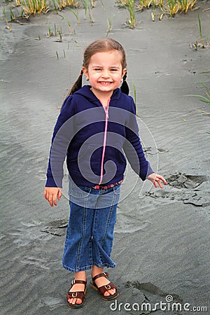 Little girl at beach Stock Photo