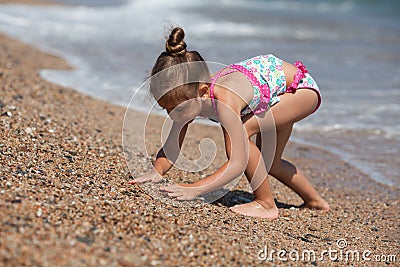 Little girl at the beach Stock Photo
