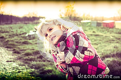 Little girl begging Stock Photo