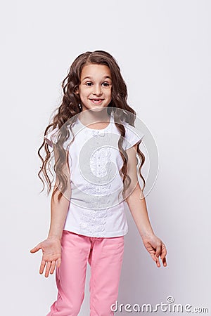 Little girl. Bewilderment. Emotions misunderstanding Stock Photo