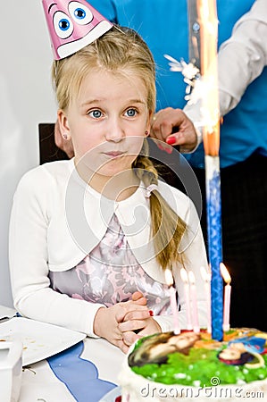 Little girl with birthday cake. Stock Photo