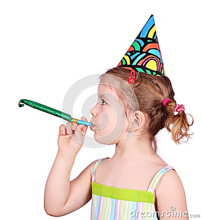 Little girl with birthday hat and trumpet party Stock Photo