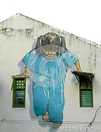 `Little girl in blue` painting on building walls, landmark of George town, Penang, Malaysia Editorial Stock Photo