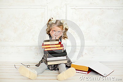 A little the girl with books Stock Photo