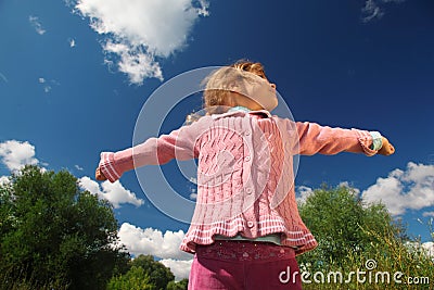 Little girl from bottom view outdoor Stock Photo
