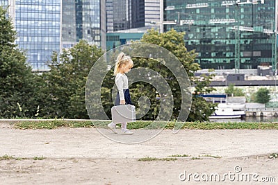 Beautiful little girl 4 years old in a white blouse Stock Photo