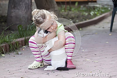 Little girl with cat Stock Photo