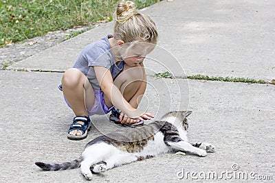 Little girl with cat Stock Photo