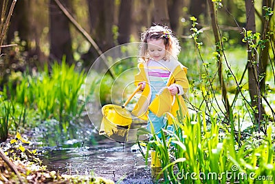 Little girl catching a frog Stock Photo