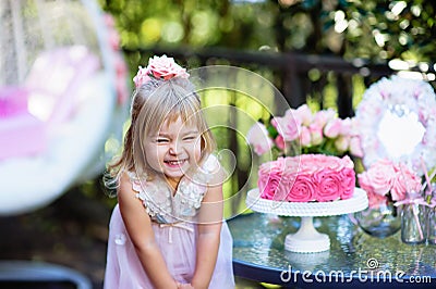 Little girl celebrate Happy Birthday Party with rose outdoor Stock Photo