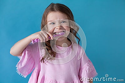 Little girl cleans teeth dentistry healthcare nice Stock Photo