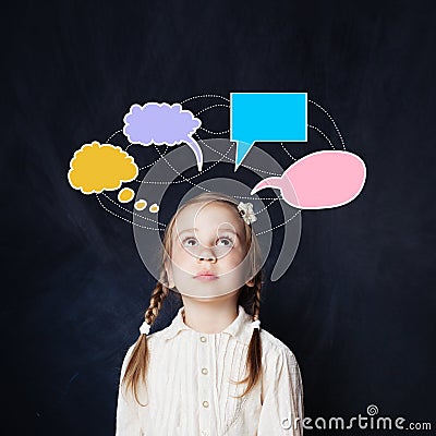 Little girl with colorful speech clouds chalk drawing Stock Photo