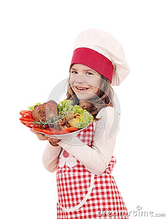 Little girl cook with big turkey drumstick Stock Photo