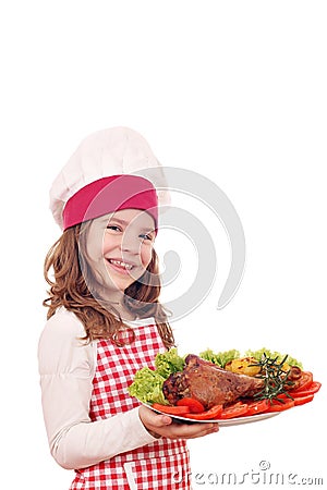 Little girl cook with drumstick Stock Photo